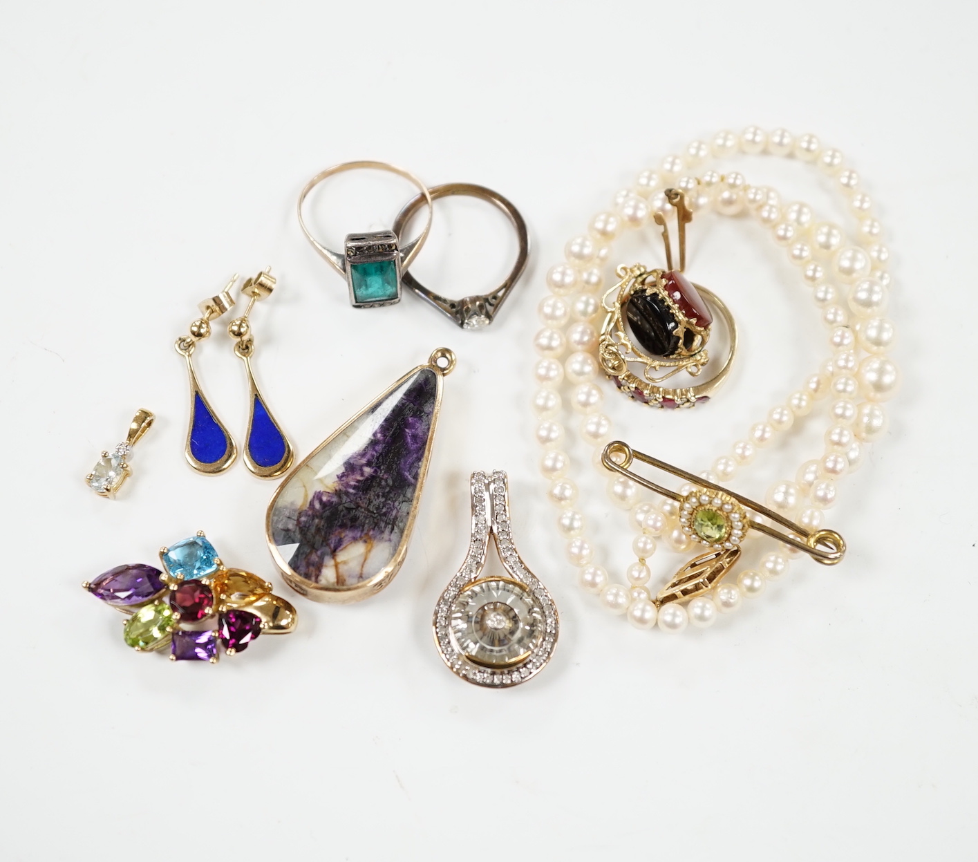 A small group of mainly modern 9ct jewellery including three gem rings, including solitaire diamond, five gem set pendants, including 9ct gold mounted banded agate and blue john, by David Scott Walker, a pair of lapis la